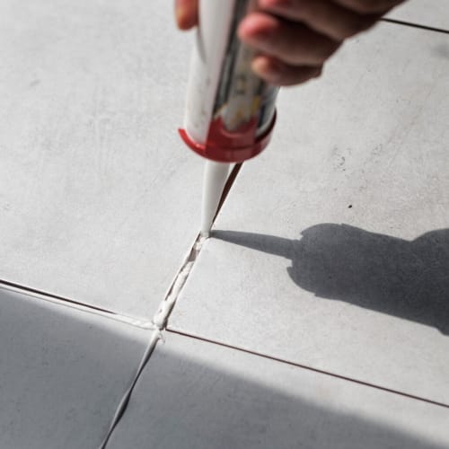 Tile grouting